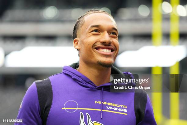 Quarterback Kellen Mond of the Minnesota Vikings walks off the field after warm-up before a preseason game against the Las Vegas Raiders before a...