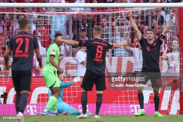 Thomas Mueller of Bayern Muenchen celebrates their team's second goal during the Bundesliga match between FC Bayern München and VfL Wolfsburg at...