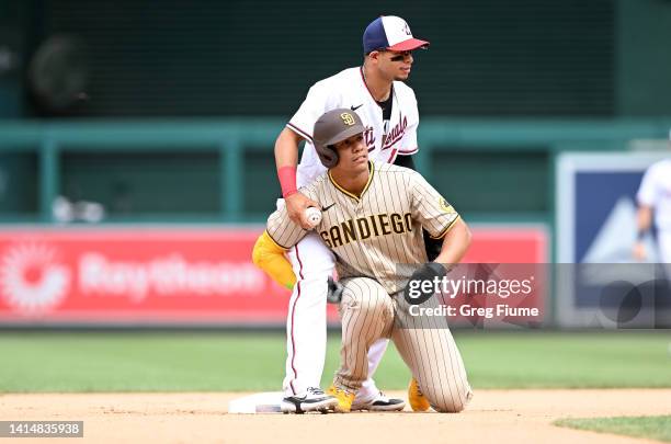 Juan Soto of the San Diego Padres is forced out at second base in the seventh inning by Cesar Hernandez of the Washington Nationals at Nationals Park...