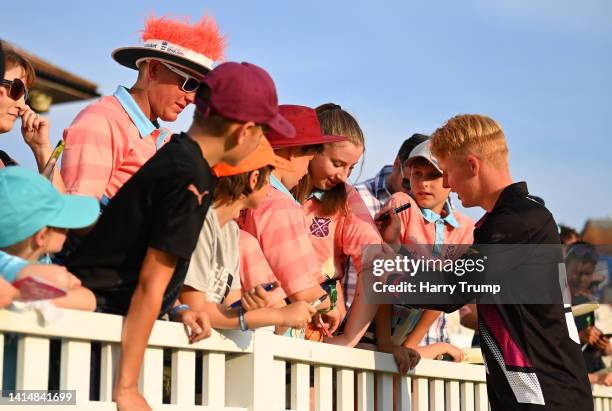 James Rew of Somerset signs autographs for spectators following the Royal London One Day Cup match between Somerset and Middlesex at The Cooper...