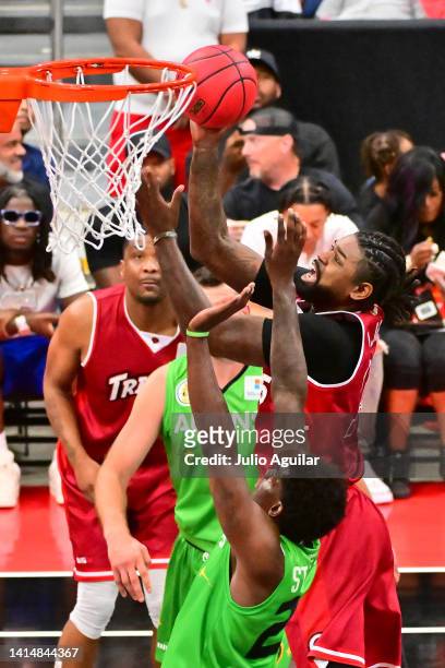 Amir Johnson of the Trilogy makes the shot and gets the foul against Deshawn Stephens of the Aliens during the BIG3 Playoffs on August 14, 2022 at...