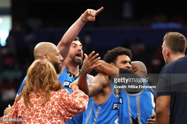 Glen Rice Jr. #41 of the Power celebrates with teammates after making the game winning shot to defeat the 3 Headed Monsters during the BIG3 Playoffs...