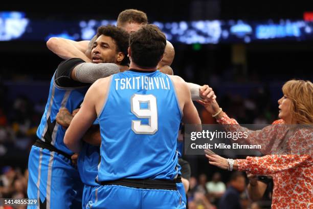 Glen Rice Jr. #41 of the Power celebrates with teammates after making the game winning shot to defeat the 3 Headed Monsters during the BIG3 Playoffs...