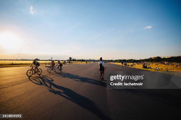 sunset on tempelhof airport - tempelhof airport stock pictures, royalty-free photos & images