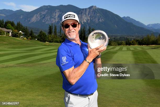 Miguel Angel Jimenez of Spain poses with the trophy after winning the Boeing Classic at The Club at Snoqualmie Ridge on August 14, 2022 in...