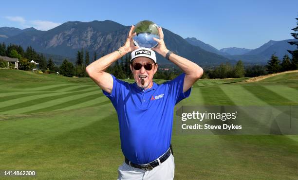 Miguel Angel Jimenez of Spain poses with the trophy after winning the Boeing Classic at The Club at Snoqualmie Ridge on August 14, 2022 in...