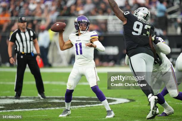 Quarterback Kellen Mond of the Minnesota Vikings throws against the Las Vegas Raiders during the second half of a preseason game at Allegiant Stadium...