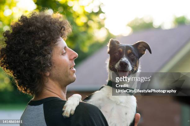 dog and her owner - purebred stock pictures, royalty-free photos & images