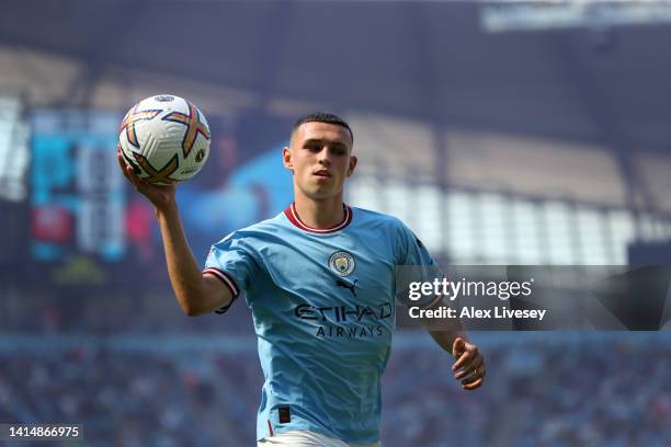 Phil Foden of Manchester City walks over to take a corner during the Premier League match between Manchester City and AFC Bournemouth at Etihad...