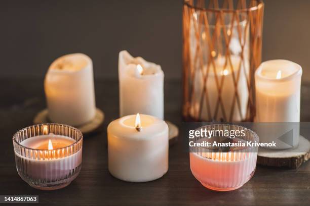 burning scented candles for relax on white wooden table. - candles stock pictures, royalty-free photos & images