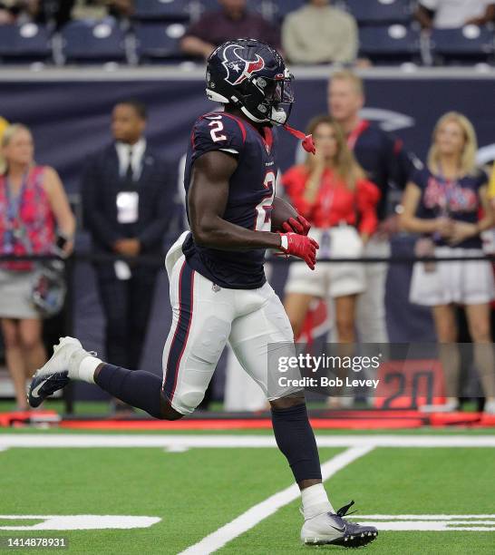 Marlon Mack of the Houston Texans warms up before playing the New Orleans Saints in a preseason game at NRG Stadium on August 13, 2022 in Houston,...