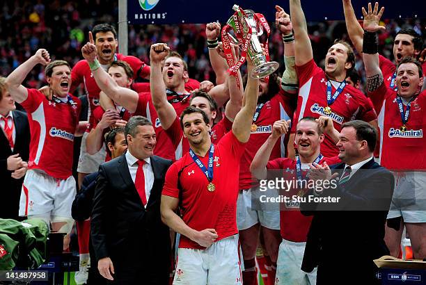 Wales captain Sam Warburton lifts the Six Nations trophy after his team win the match and the Grand Slam during the RBS Six Nations Championship...