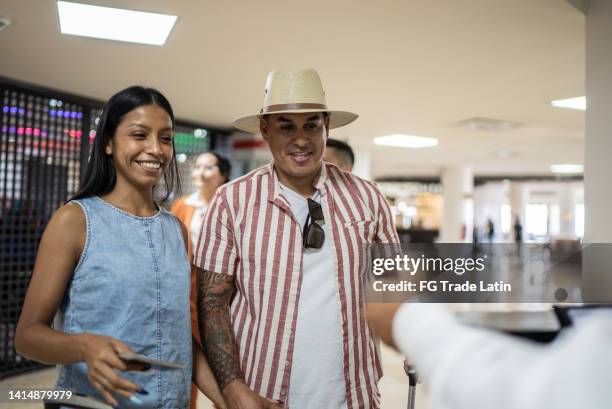 couple doing passport control at airport - getting on stock pictures, royalty-free photos & images