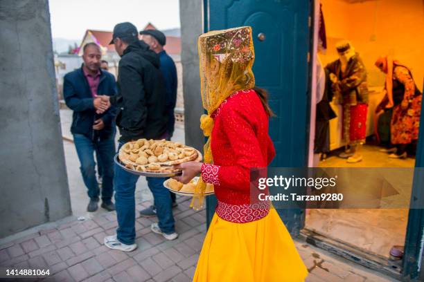 a wedding party in a tajik ethnic in xinjiang province, china - tajiks stock pictures, royalty-free photos & images