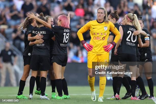 Angel City FC players celebrate a goal by Savannah McCaskill in the second half of a game against the Chicago Red Stars at Banc of California Stadium...