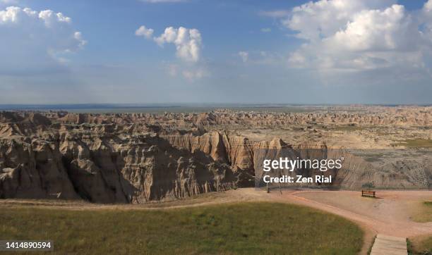 panoramic view of badlands national park and cloudscape - badlands national park foto e immagini stock