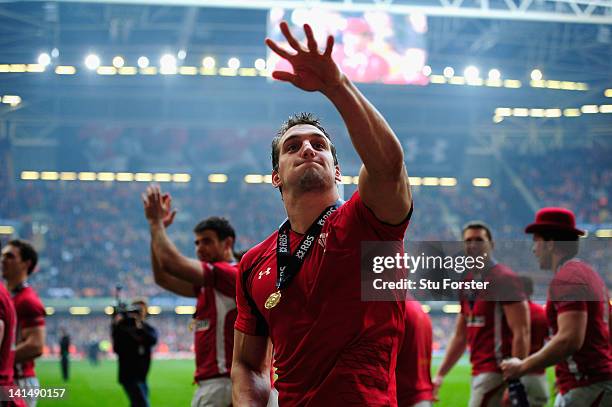 Wales captain Sam Warburton celebrates with team mates after winning the Grand Slam after the RBS Six Nations match between Wales and France at the...