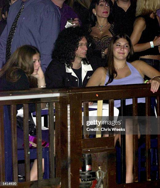Howard Stern relaxes with his two daughters April 25, 2000 at the House of Blues in Los Angeles, CA. The recent divorcee took his teenage daughters...