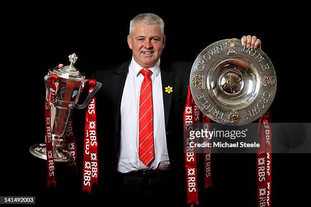 Wales head coach Warren Gatland poses with the Six Nations trophy during the RBS Six Nations Championship match between Wales and France at the...