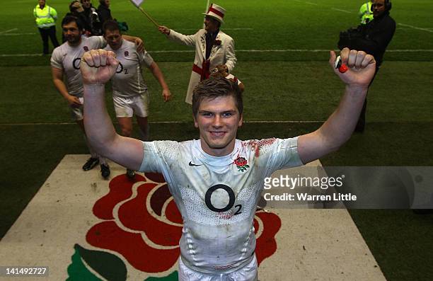 Owen Farrell of England celebrates as he walks down the tunnel after the RBS 6 Nations match between England and Ireland at Twickenham Stadium on...