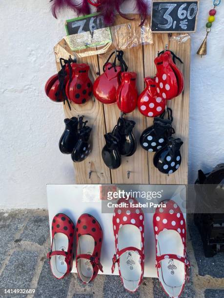 souvenirs from andalusia in a shop - castanets stock pictures, royalty-free photos & images