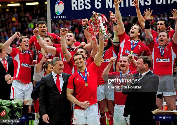 Wales captain Sam Warburton lifts the Six Nations trophy after his team win the match and the Grand Slam during the RBS Six Nations Championship...