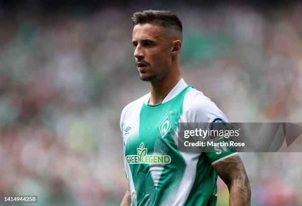 Marco Friedl of SV Werder Bremen controls the ball during the Bundesliga match between SV Werder Bremen and VfB Stuttgart at Wohninvest Weserstadion...