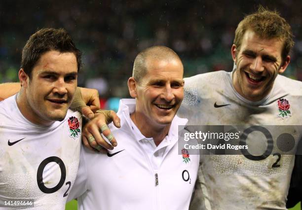 Stuart Lancaster, head coach of England celebrates victory with Brad Barritt and Tom Croft after the RBS 6 Nations match between England and Ireland...