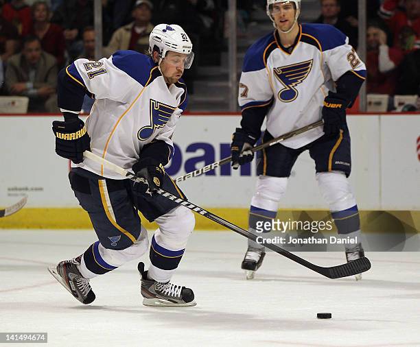 Patrik Berglund of the St. Louis Blues controls the puck against the Chicago Blackhawks at the United Center on March 13, 2012 in Chicago, Illinois....