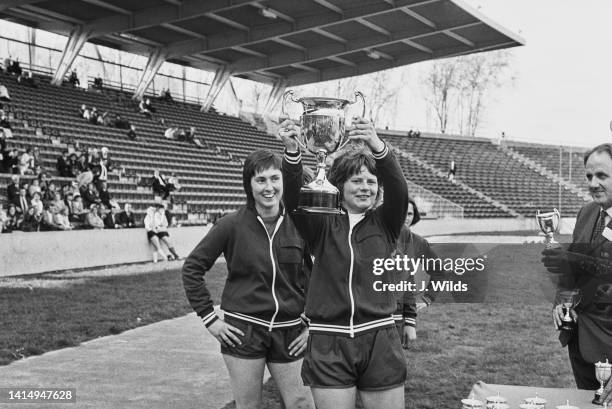 British soccer player Lesley Lloyd, captain of Southampton Women's FC, holds the cup after winning the final against Stewarton Thistle at the Mitre...