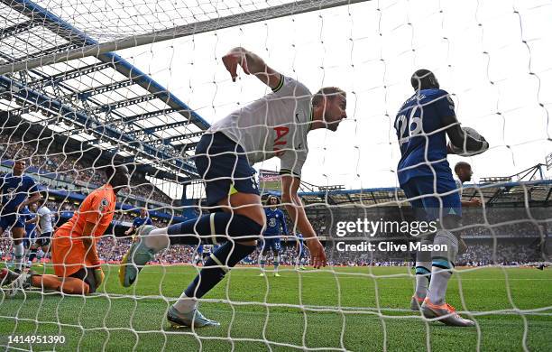 Harry Kane of Tottenham Hotspur celebrates after scoring their sides second goal during the Premier League match between Chelsea FC and Tottenham...