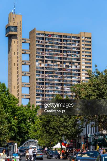 london united kingdom iconic trellick tower building listed tower block on the cheltenham estate in kensal green, northwest london in brutalist style. people can be seen on the street. - trellick tower stock pictures, royalty-free photos & images
