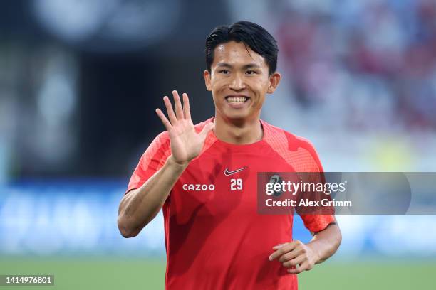 Woo-Yeong Jeong of Freiburg warms u prior to the Bundesliga match between Sport-Club Freiburg and Borussia Dortmund at Europa-Park Stadion on August...