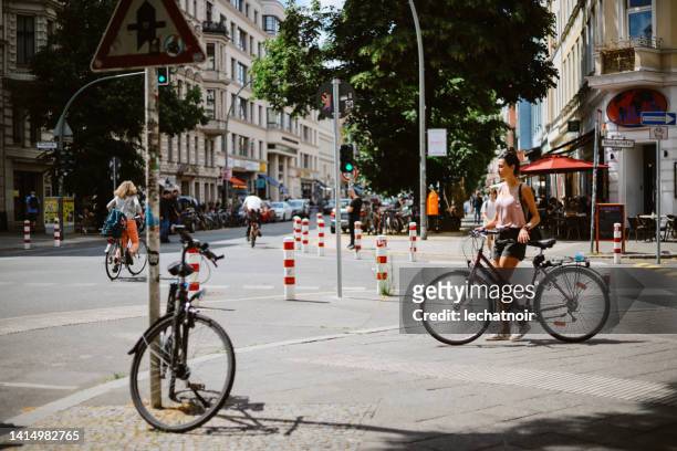 female commuter in berlin kreuzberg - kreuzberg stock pictures, royalty-free photos & images