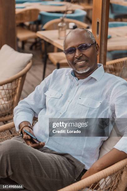 portrait of handsome senior african man - somali people stock pictures, royalty-free photos & images