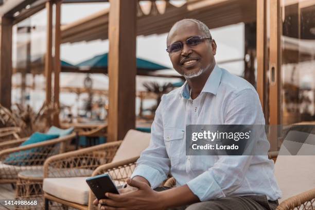 portrait of handsome senior african man - somali people stock pictures, royalty-free photos & images