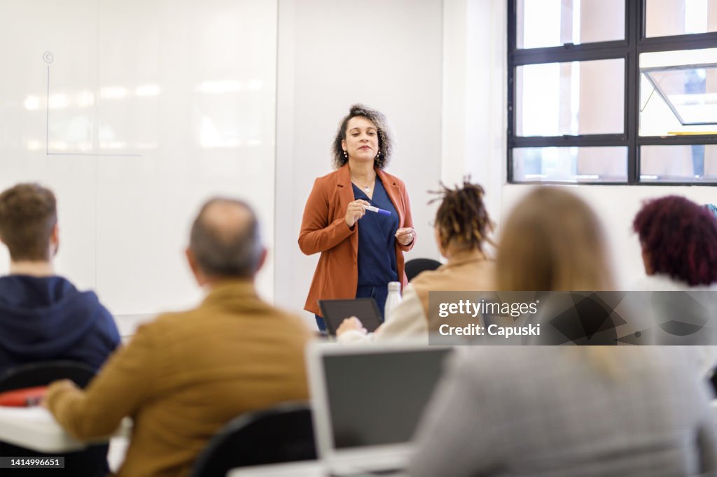 Video Professor Professor Teaching In A Full Classroom High-Res Stock Photo - Getty Images