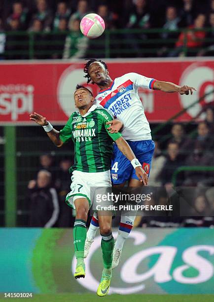 Lyon's Burkinabe defender Bakary Kone vies with Saint-Etienne's French forward Loris Nerry during the French L1 football match Saint-Etienne vs Lyon...