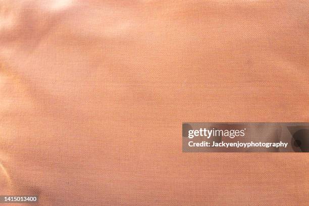 full frame shot of orange textile - tablecloth stock pictures, royalty-free photos & images