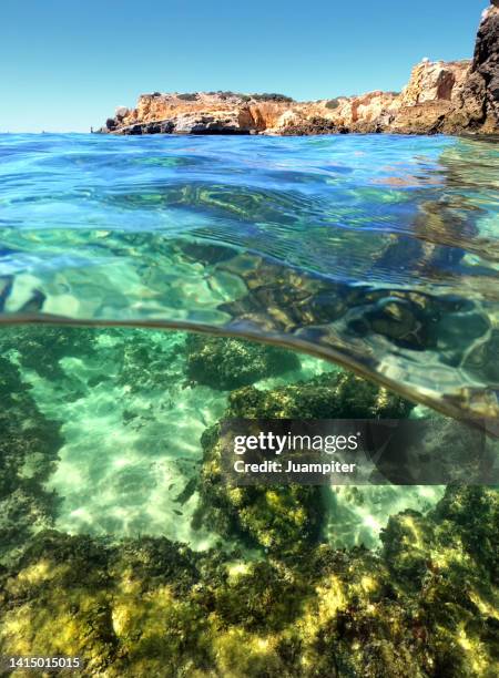 split image of a shore of the portuguese algarve - algarve underwater stock pictures, royalty-free photos & images