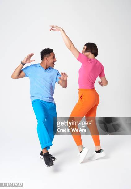 two people dancing - baile fotografías e imágenes de stock