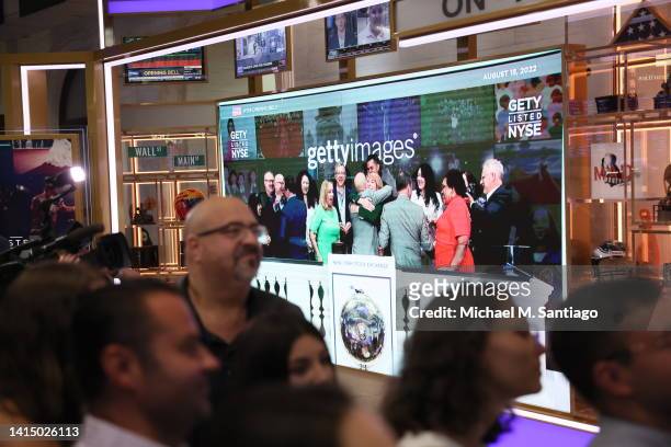 Craig Peters, CEO of Getty Images, celebrates with Getty Images employees after the ringing of the opening bell at the New York Stock Exchange on...