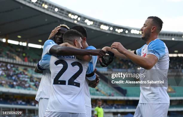 Victor Osimhen of Napoli celebrates with teammates after scoring their team's second goal during the Serie A match between Hellas Verona and SSC...