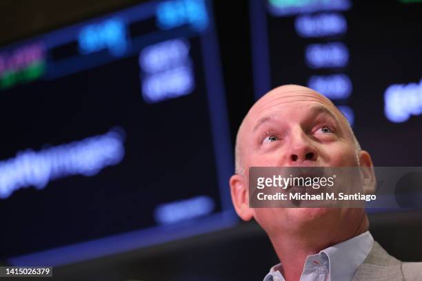 Craig Peters, CEO of Getty Images, looks up as he is interviewed on the floor of the New York Stock Exchange during morning trading on August 15,...