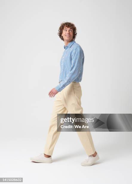 young man looking over his shoulder - smart casual male stock pictures, royalty-free photos & images