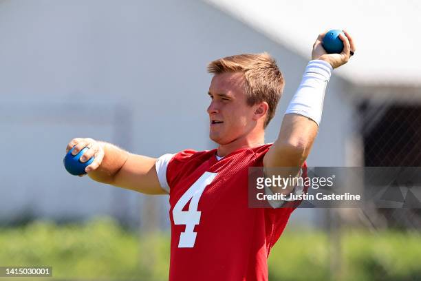 Sam Ehlinger of the Indianapolis Colts warms up during training camp at Grand Park Sports Campus on August 11, 2022 in Westfield, Indiana.