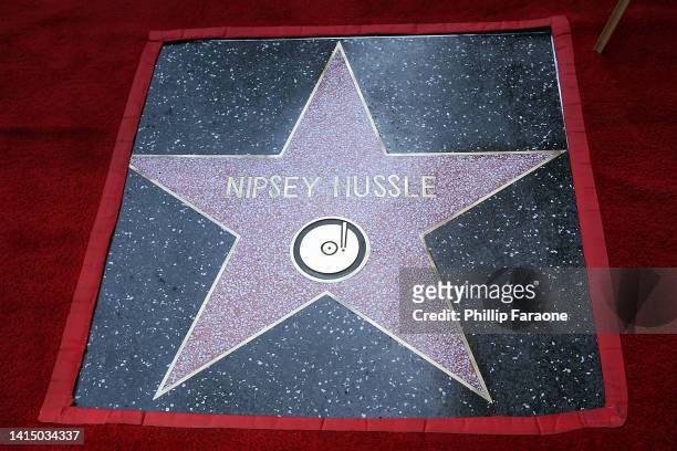 Nipsey Hussle is posthumously honored with a star on The Hollywood Walk of Fame on August 15, 2022 in Los Angeles, California.