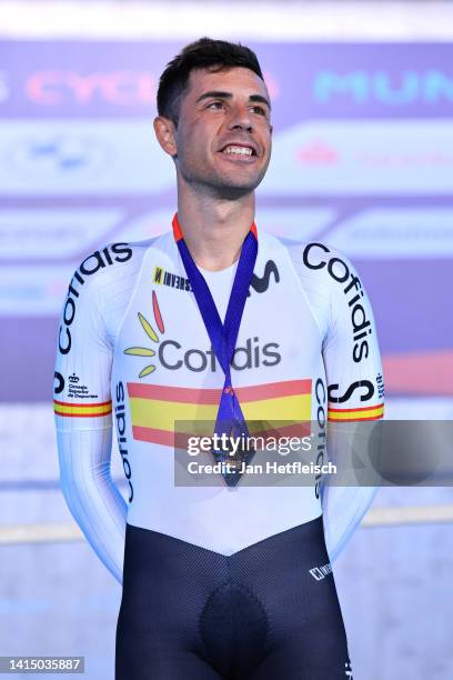 Bronze medalist Sebastian Mora Vedri of Spain poses on the podium during the Cycling Track - Men's Omnium Points Race 25km 4/4 medal ceremony on day...