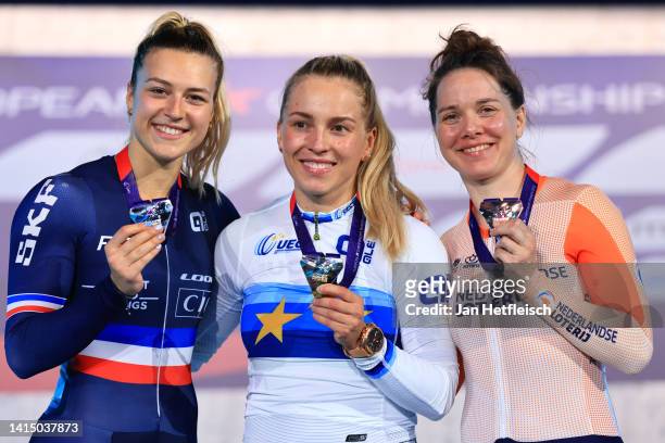Silver medalist Mathilde Gros of France, Gold medalist Emma Hinze of Germany and Broze medalist Laurine Van Riessen of Netherlands pose on the podium...