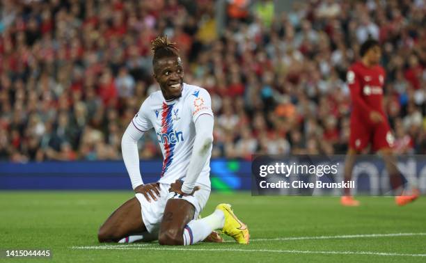 Wilfried Zaha of Crystal Palace reacts after a missed chance during the Premier League match between Liverpool FC and Crystal Palace at Anfield on...